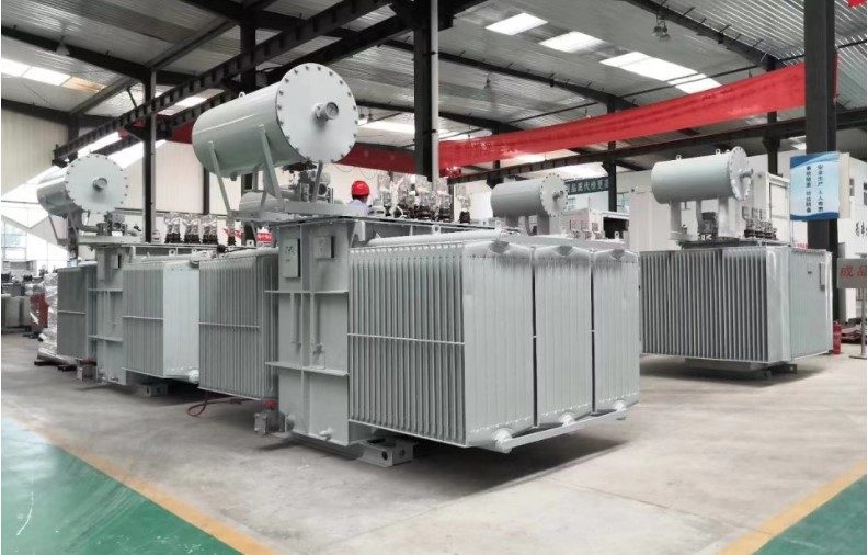 Industrial power transformers in a workshop